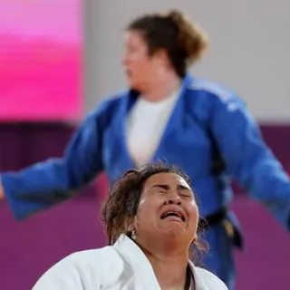 A peruana Yuliana Bolivar reage após conquistar a medalha de bronze em judo, nos XVIII Jogos Pan Americanos, que decorrem em Lima, Peru. FOTO REUTERS/Sergio Moraes