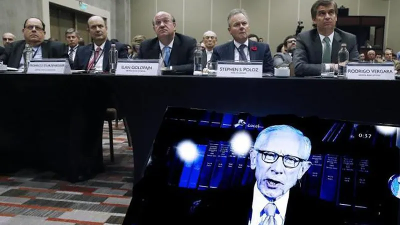 Stanley Fischer em video-conferência com os seus homólogos do Chile, Canadá, Brasil e Argentina.  Foto EPA/Mario Ruiz