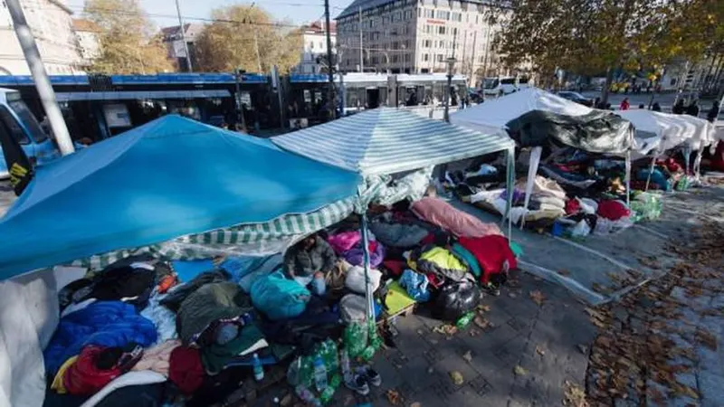Campo de refugiados em Sendlinger Tor, Munique.   Foto EPA/Matthias Balk